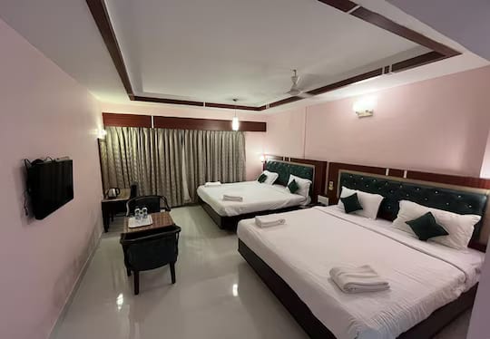 Quadruple Room with two large beds at Daffodil Inn Velankanni